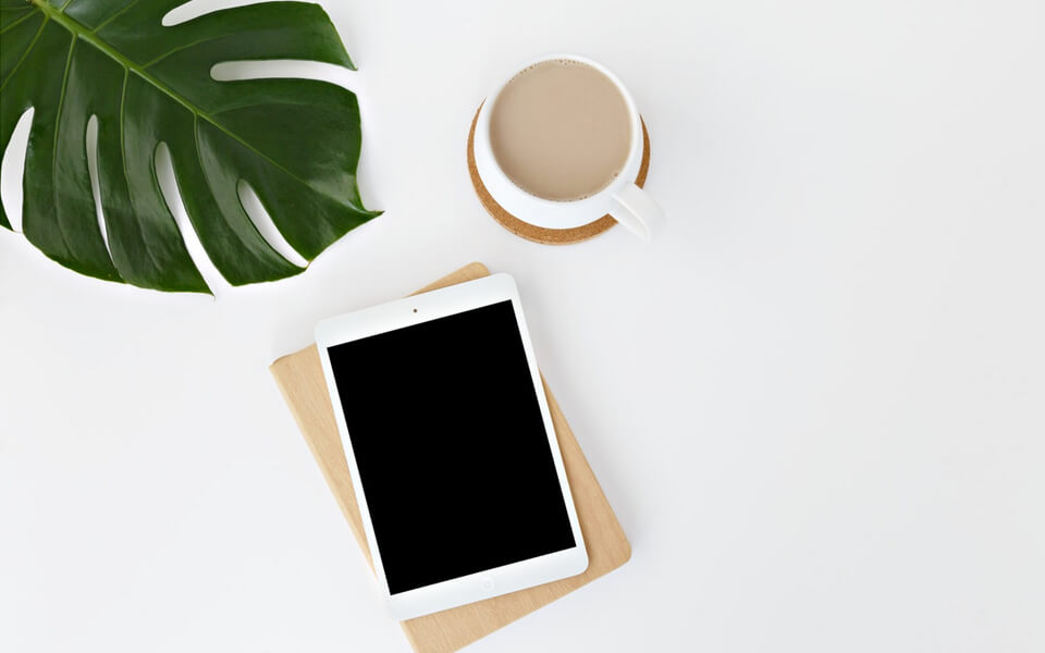 Tablet and coffee